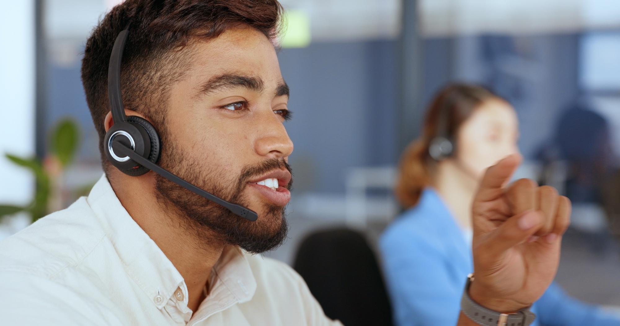 Businessman, face or talking with call center headset in Indian telemarketing company, contact us s